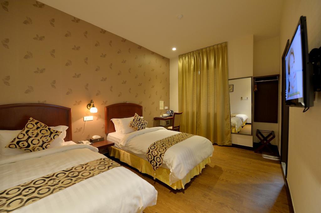 Asiana Hotel Kota Kinabalu Habitación foto